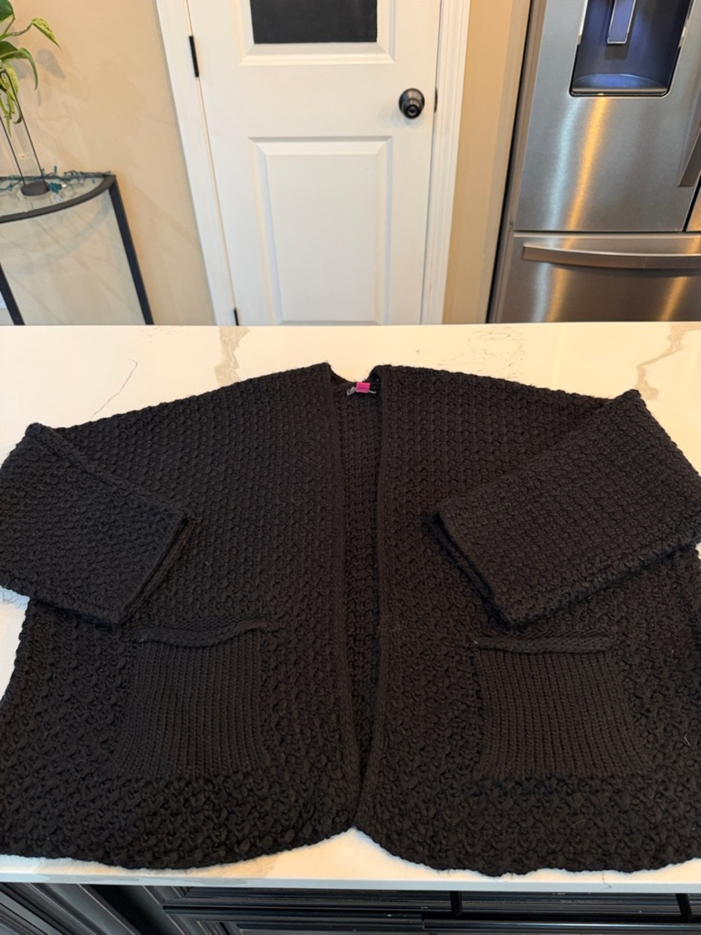 Woman’s Chunky Black Open-Front Knit Cardigan
